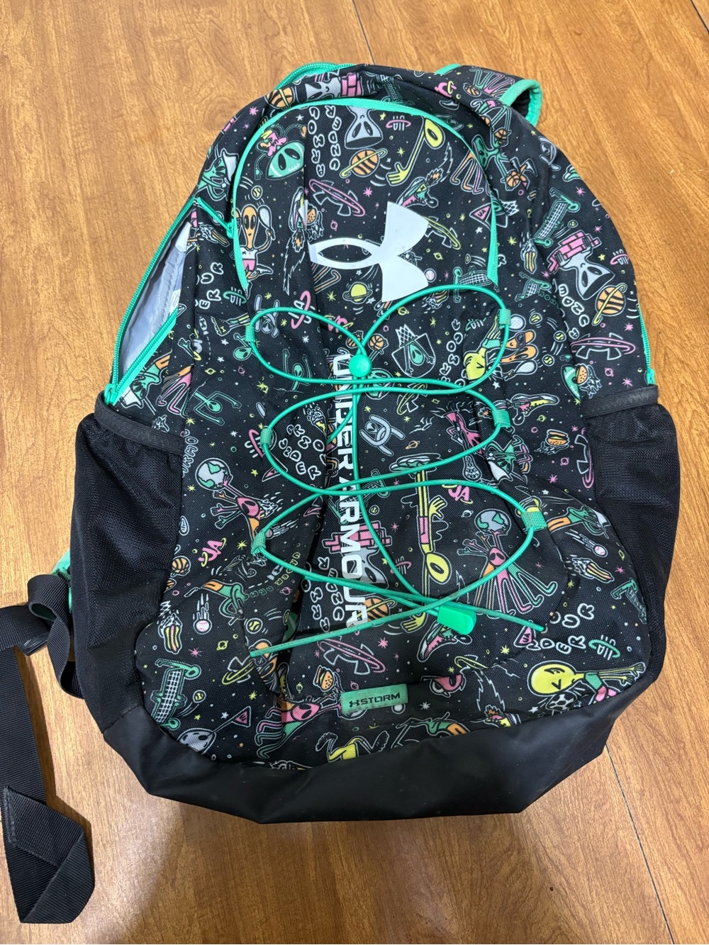 Under Armour black and neon green hustle sport backpack alien pattern